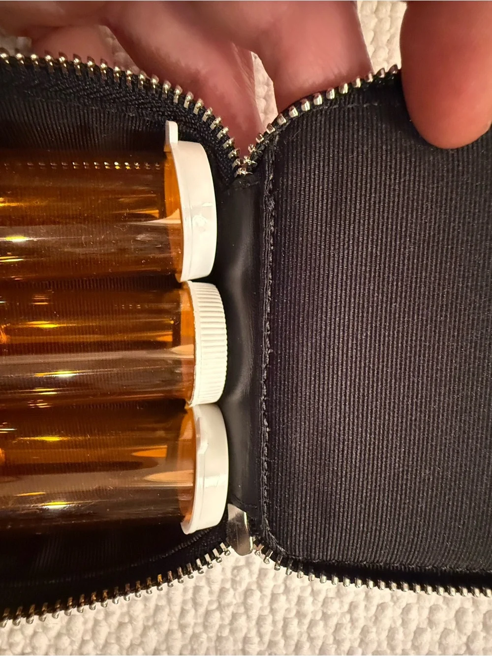 Coach Black Signature Small travel pill case. Canvas and patent leather trim.